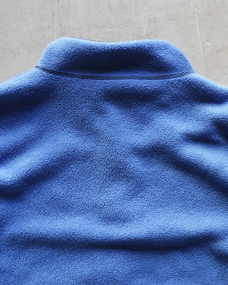 light blue and navy reversible fleece zip-up jacket