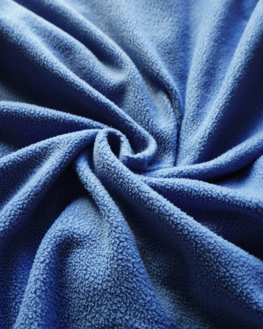 light blue and navy reversible fleece zip-up jacket