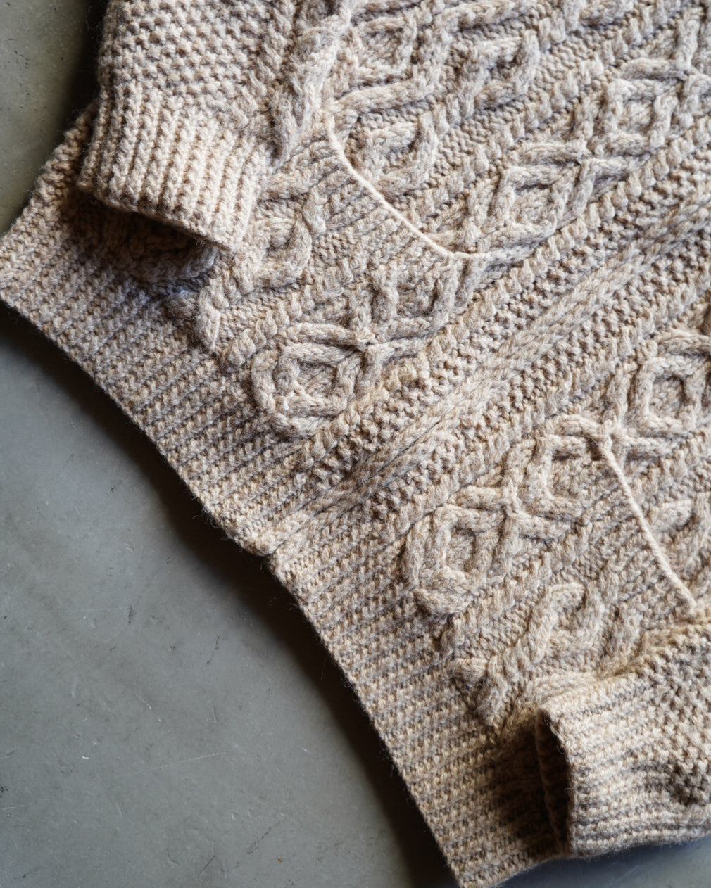 wool rich aran knit zip-up sweater