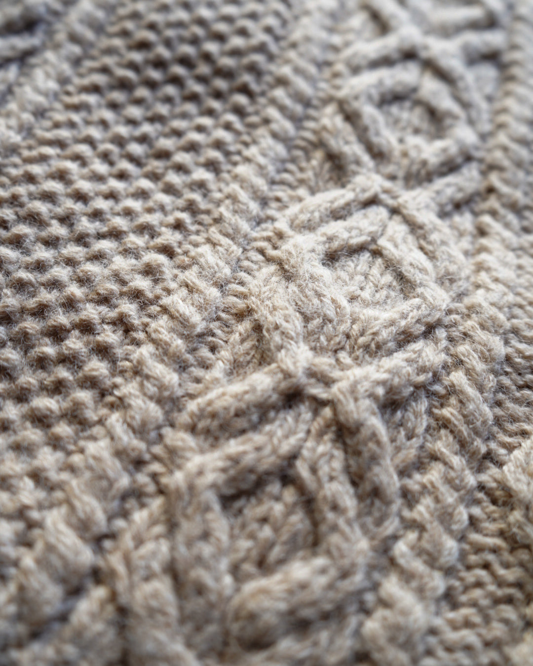 wool rich aran knit zip-up sweater