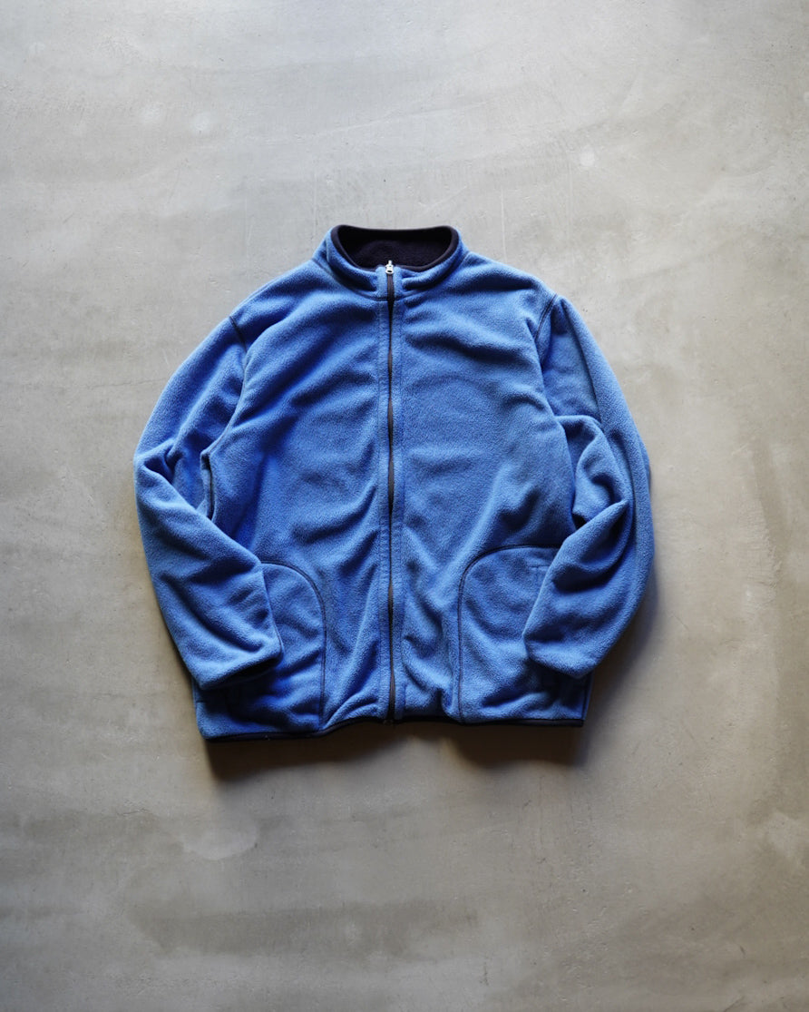 light blue and navy reversible fleece zip-up jacket