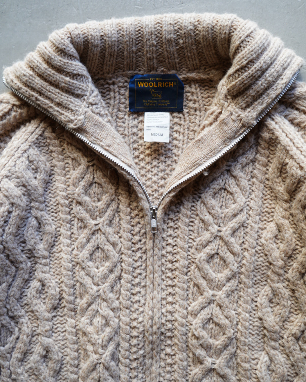 wool rich aran knit zip-up sweater