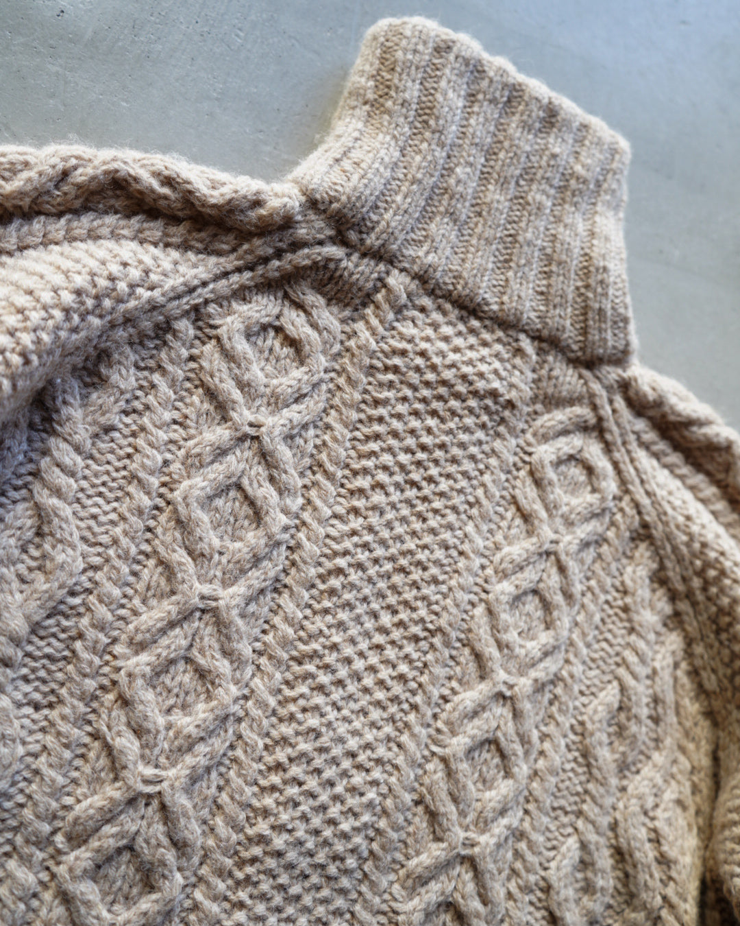 wool rich aran knit zip-up sweater