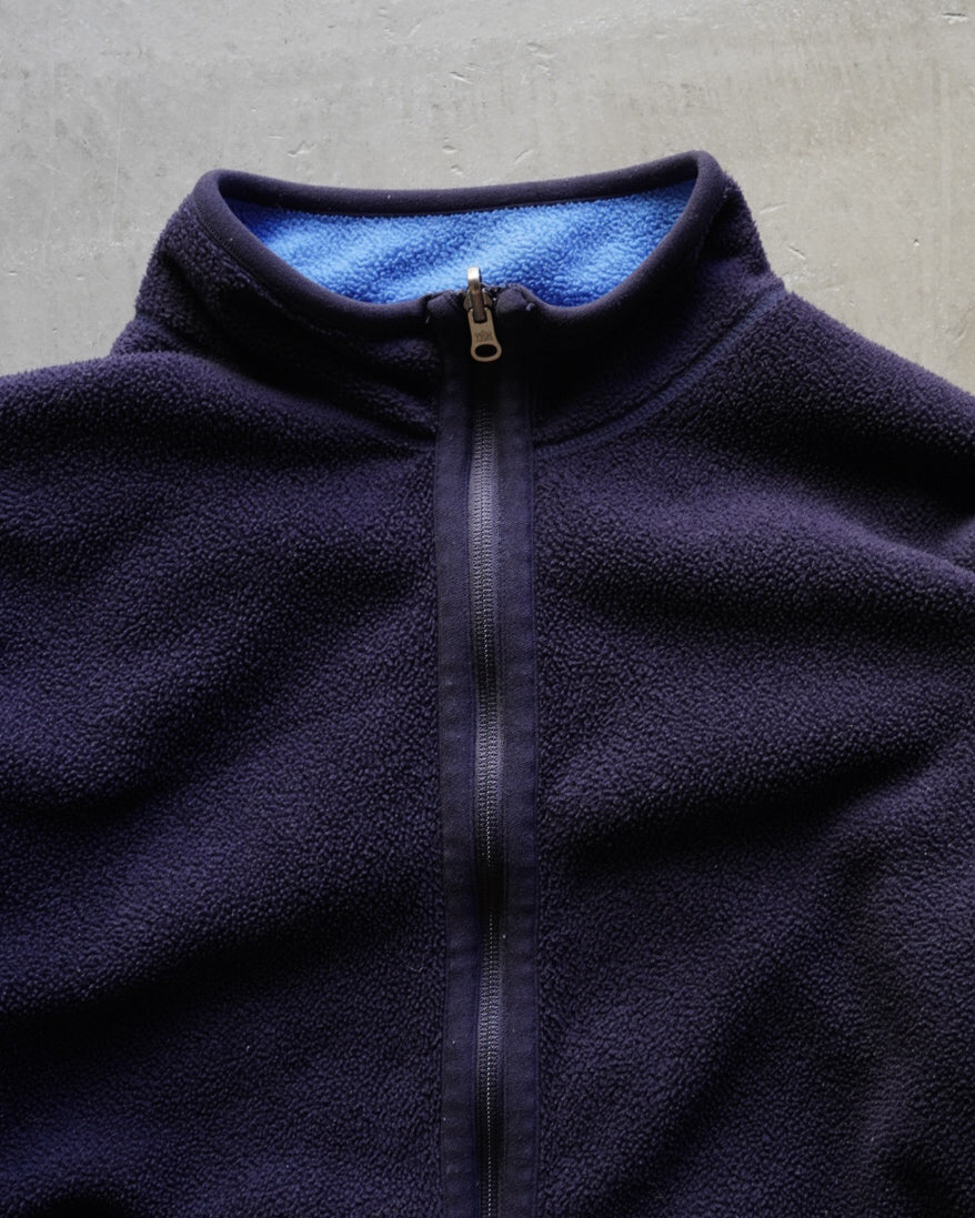 light blue and navy reversible fleece zip-up jacket