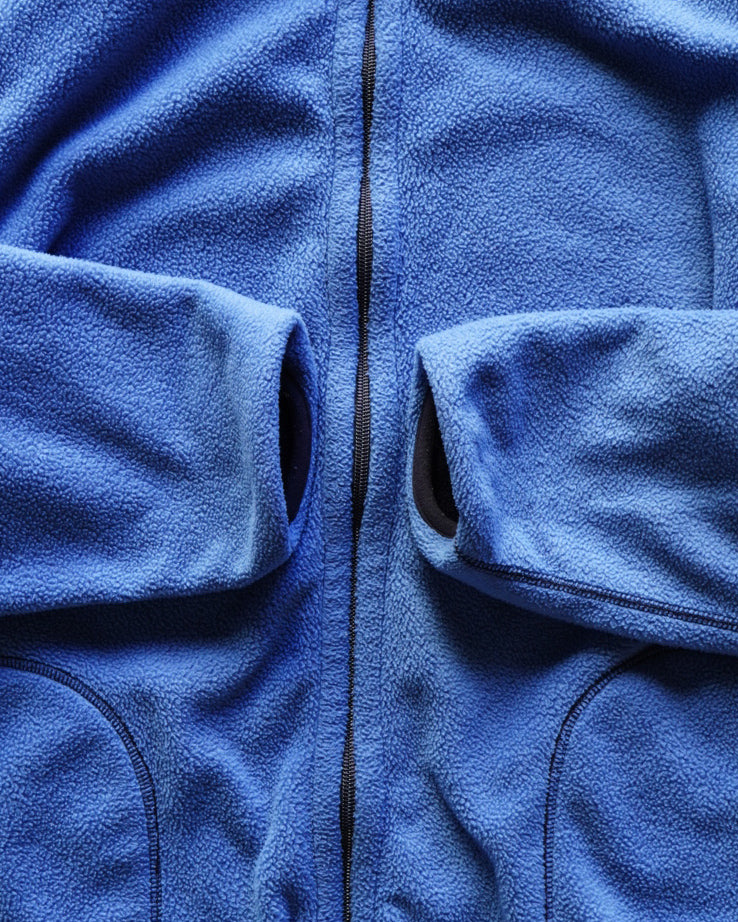 light blue and navy reversible fleece zip-up jacket